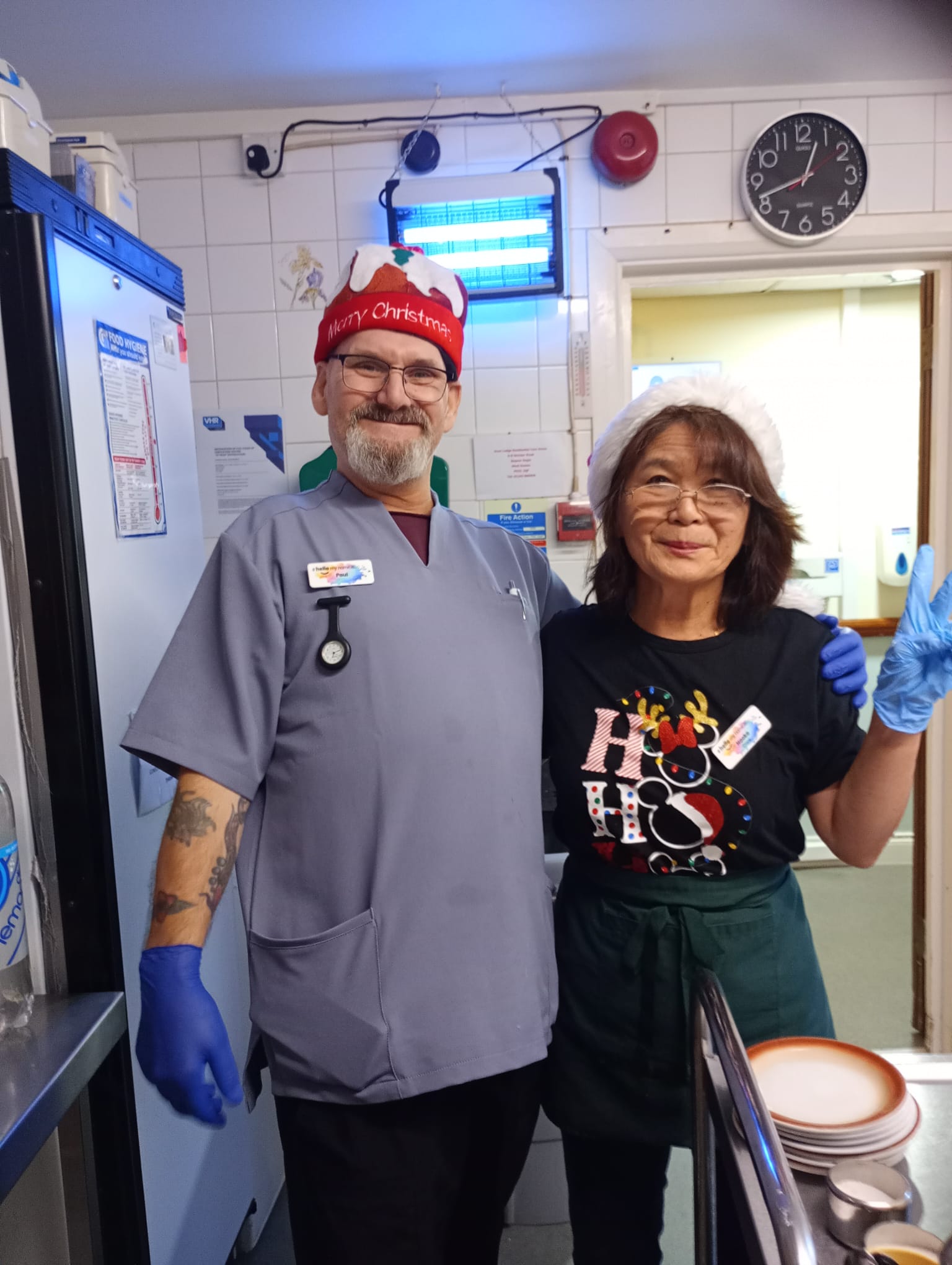 Two Arun Lodge staff members smiling together